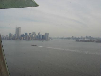 New York City from the crown of the Statue of Liberty<br>Location: <a href="https://www.google.com/maps/search/?api=1&query=40.68929,-74.04456" target="_new">Statue of Liberty</a>